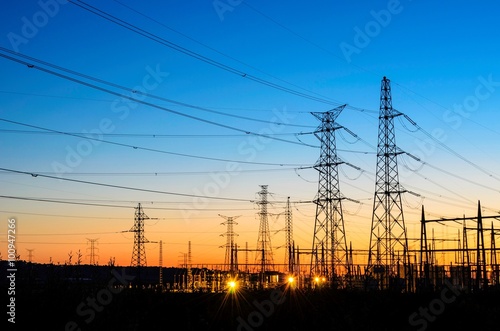 Electric powerlines over sunrise