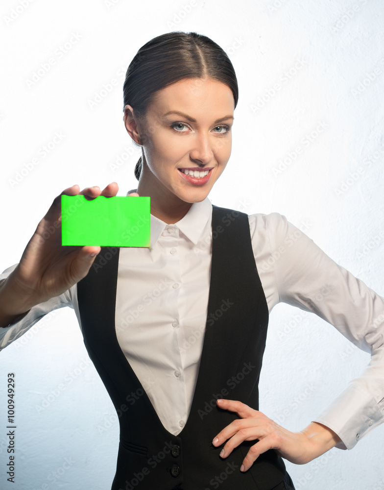 Managing Director smiling showing business card green Managing Director smiling showing business card green