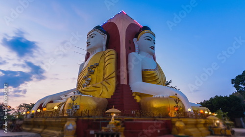 Kyaikpun Buddha Landmark Of Bago, Myanmar Time Lapse Sunset photo