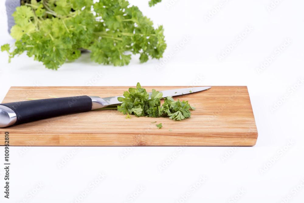 parsley on a chopping board cookery parsley on a chopping board cookery