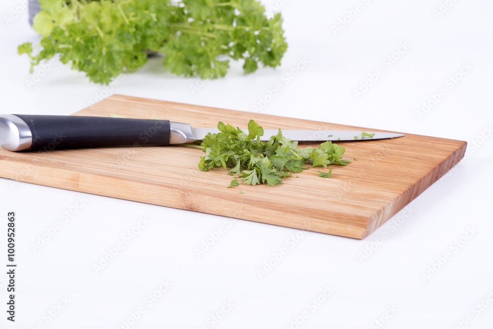 parsley on a chopping board cookery parsley on a chopping board cookery