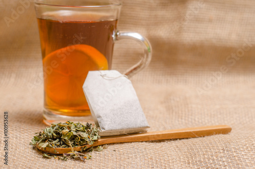 Cup of tea on wooden rustic background photo