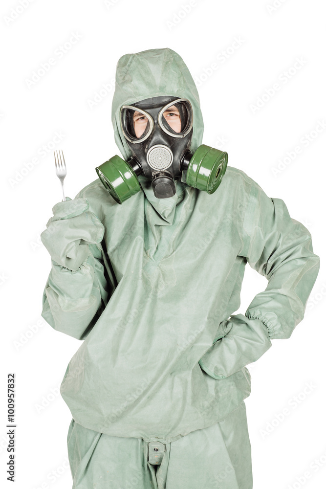 Man with protective mask and protective clothes shows a fork for Man with protective mask and protective clothes shows a fork for
