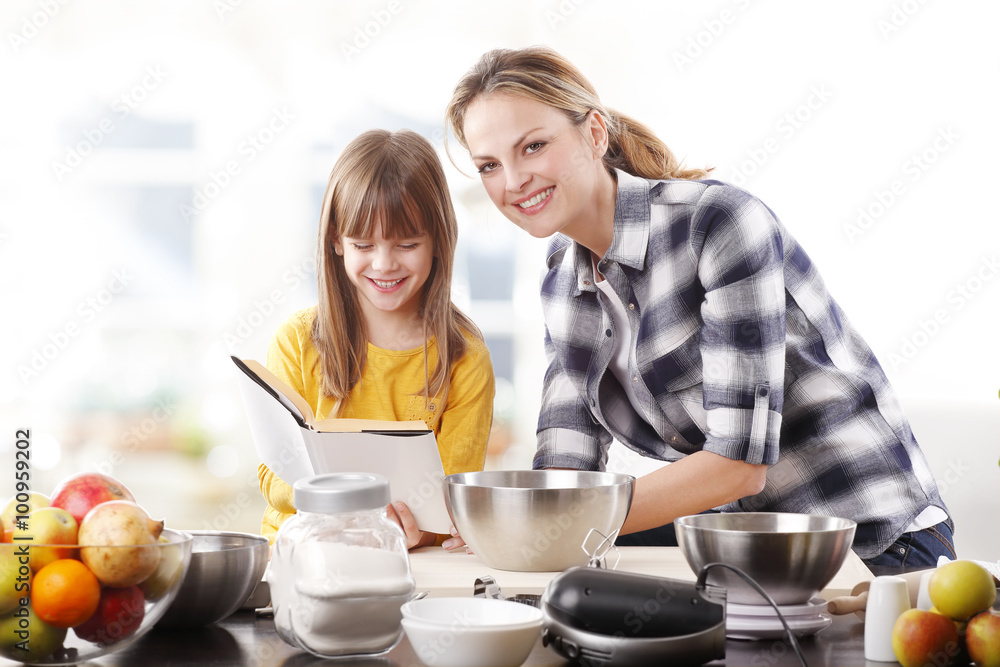 Mother and daughter at the kitchen