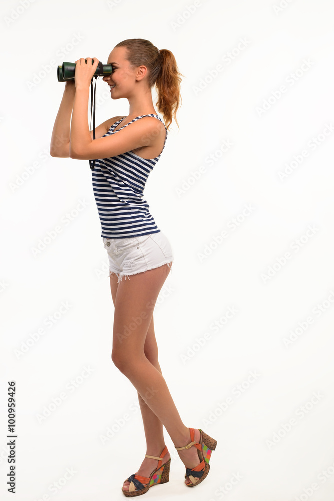 Tourist looking through binocular. Tourist looking through binocular.