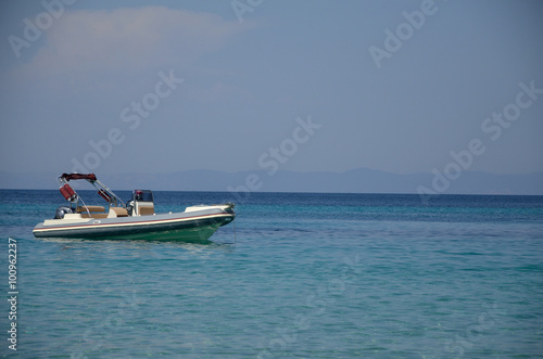 White Powerboat on Turquoise Sea © branislav