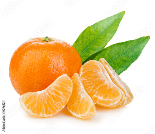 Ripe mandarin with leaves close-up on a white background. Tangerine orange with leaves on a white background.