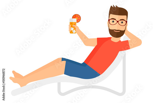 Man sitting in chaise longue.