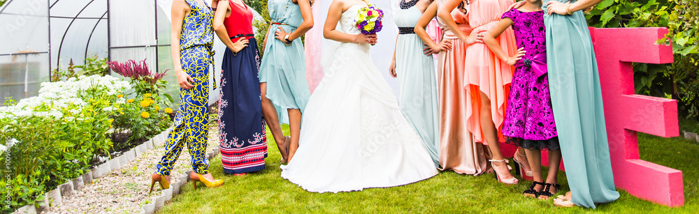 Stylish bridesmaids have fun with bride