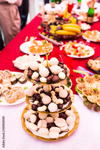 white and brown chocolate candies on the plate © satura_