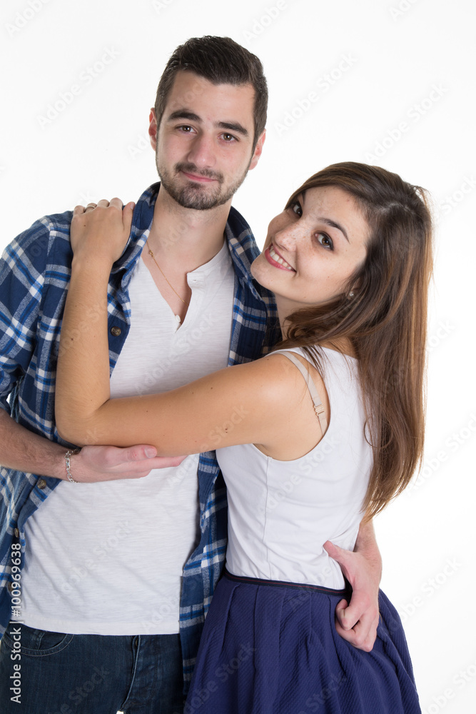 Beautiful happy couple love smiling embracing, man and woman smile looking at camera, isolated over white background Beautiful happy couple love smiling embracing, man and woman smile looking at camera, isolated over white background