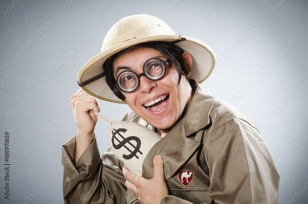 Funny safari traveller in travelling concept Funny safari traveller in travelling concept