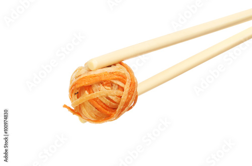 Oriental snack in chopsticks