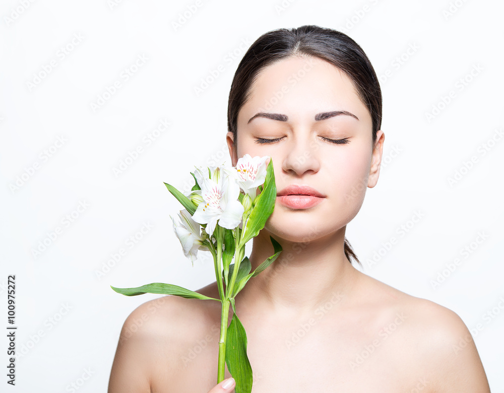 beautiful girl with a lily in the spa beautiful girl with a lily in the spa