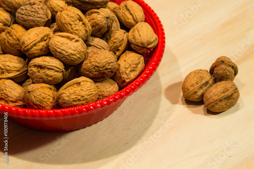 Walnuts on a rustic wooden table
