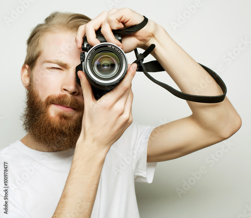 Young bearded  photographer © Raisa Kanareva