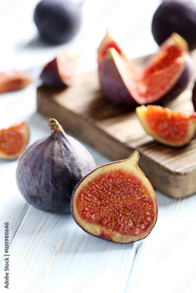 Fresh figs on a blue wooden table Fresh figs on a blue wooden table