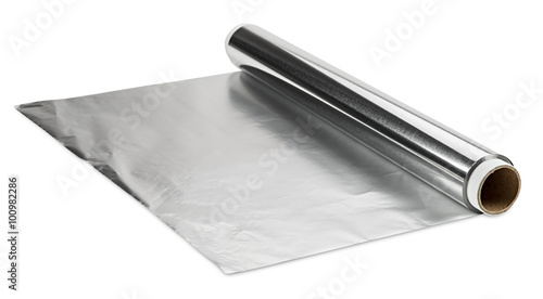 roll of aluminum foil isolated on white background photo