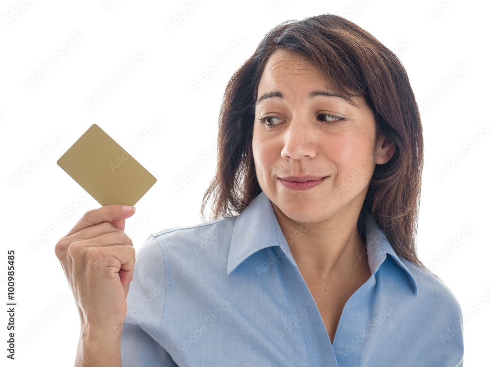 A young mixed race woman has second thoughts about a credit card or gift card. A young mixed race woman has second thoughts about a credit card or gift card.