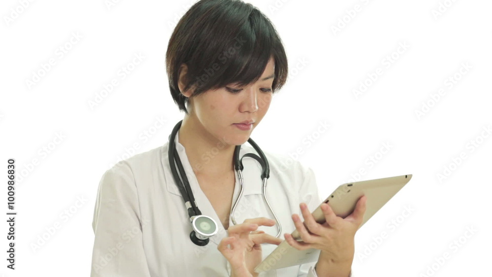 Asian doctor with tablet computer thumbs up Asian doctor with tablet computer thumbs up