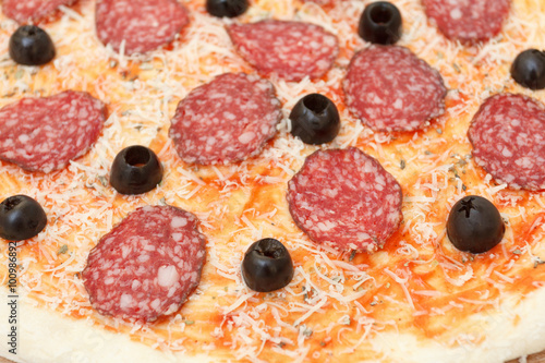 Homemade pizza with salami,...