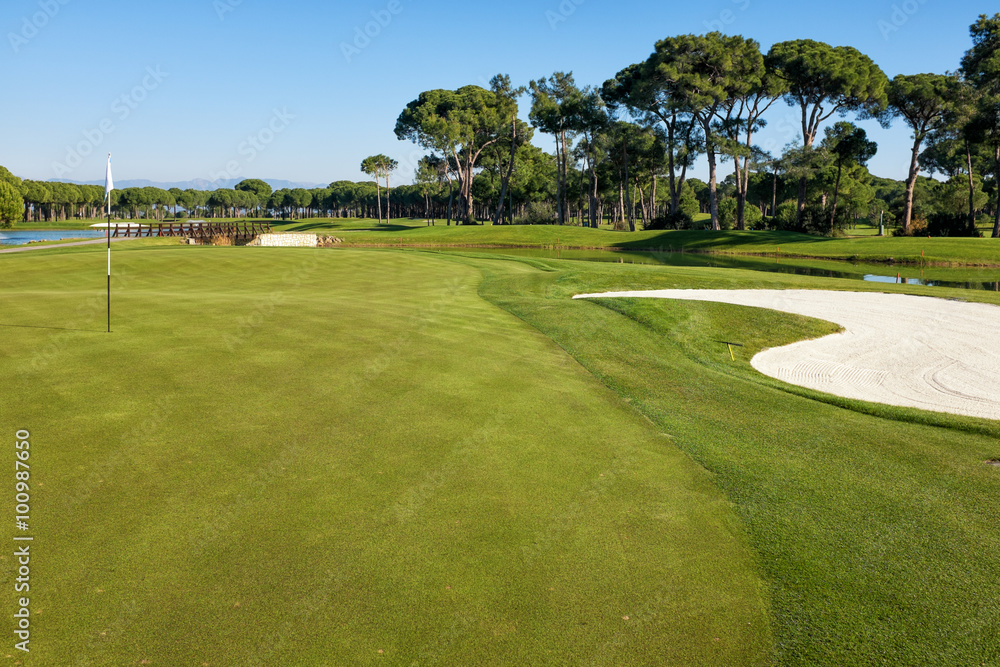 playing golf on a golf course