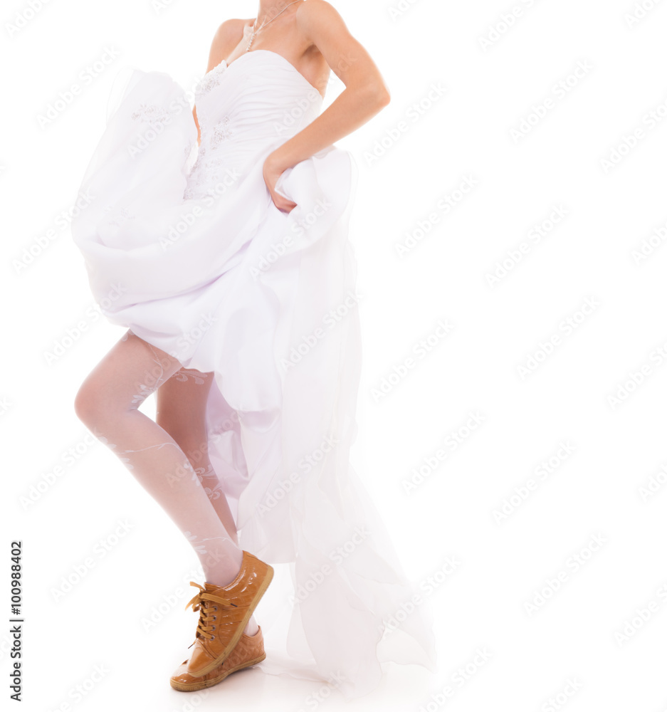 Wedding. Running bride funny woman in sport shoes