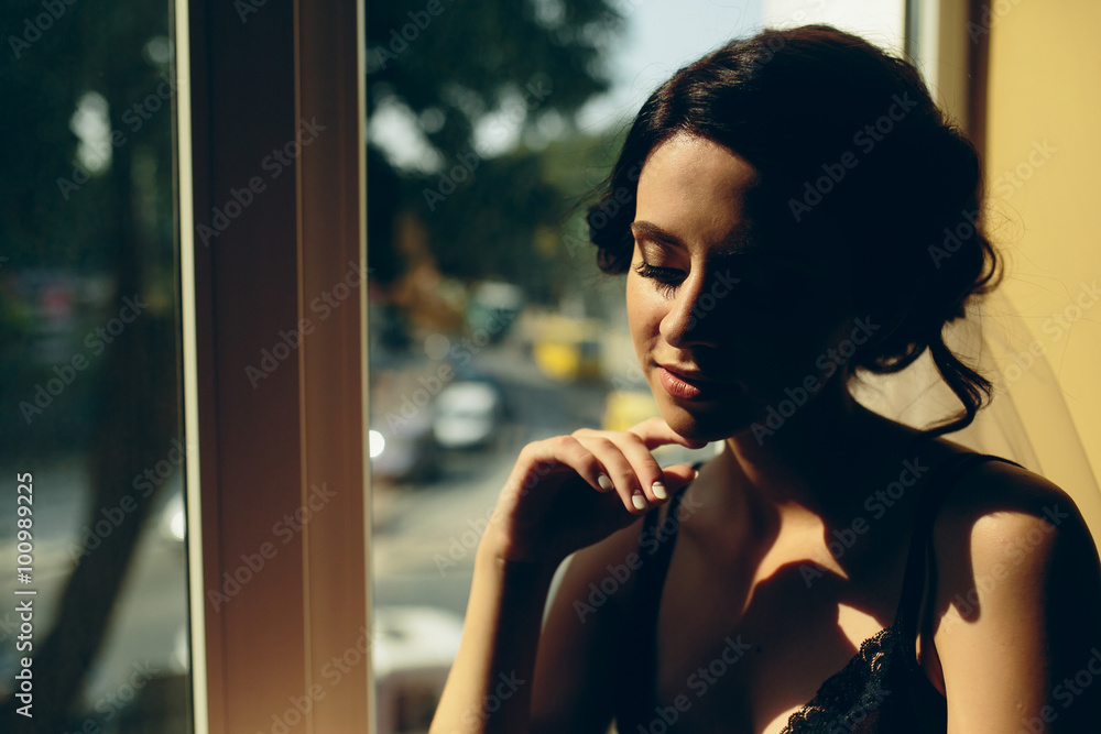 bride looking through the window bride looking through the window