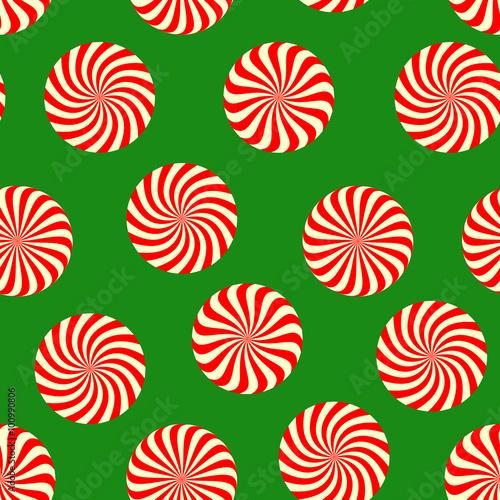 Peppermint candy seamless pattern on green background. Concept for Christmas holiday wrapping paper with mint color sweets. Vector illustration