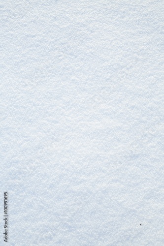 Fresh real snow texture background in blue tone
