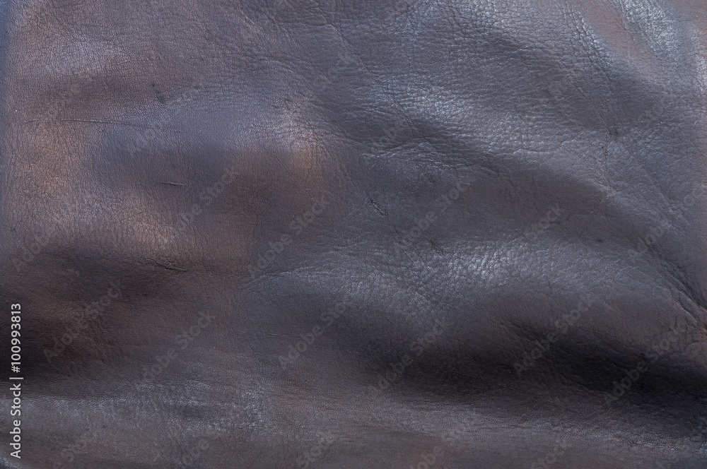 Wrinkled black leather bag's surface with fine details of texture Wrinkled black leather bag's surface with fine details of texture