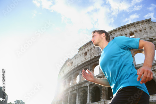 Photography Running male runner jogging against Colosseum