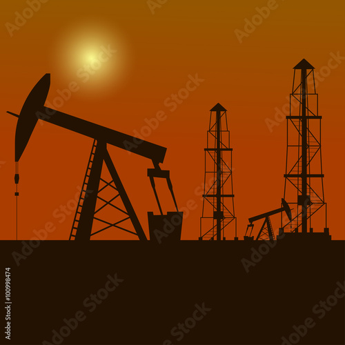 Silhouette of oil derrick