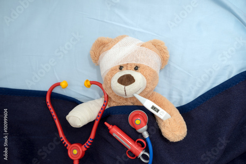 sick Teddy / Teddy Bear with Bandage and Clinical Thermometer