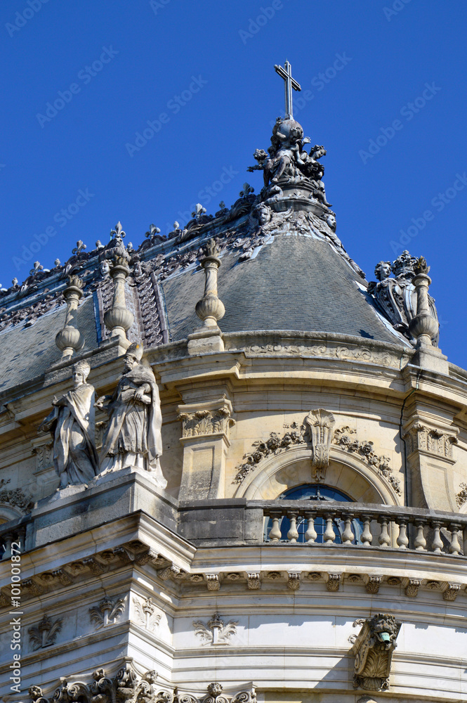 Ornamented buildings of the Royal Chapel in front of the Palace of Versailles, France