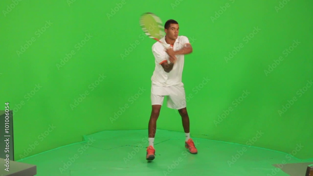 Professional tennis player makes different types of shots on a green