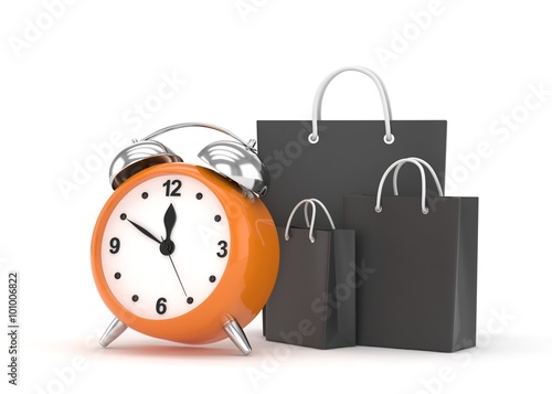 alarm clock and shopping bag (time to buy concept)