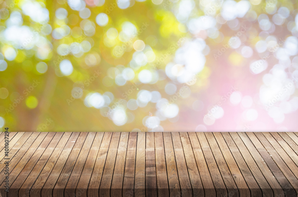 Wood table top on shiny bokeh background Wood table top on shiny bokeh background
