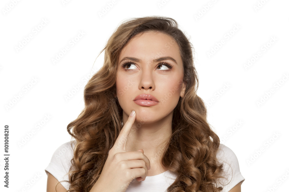 beautiful thoughtful girl on a white background beautiful thoughtful girl on a white background