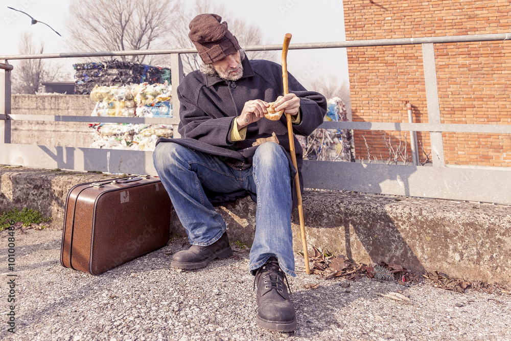 tramp eating bread sitting in landfills tramp eating bread sitting in landfills