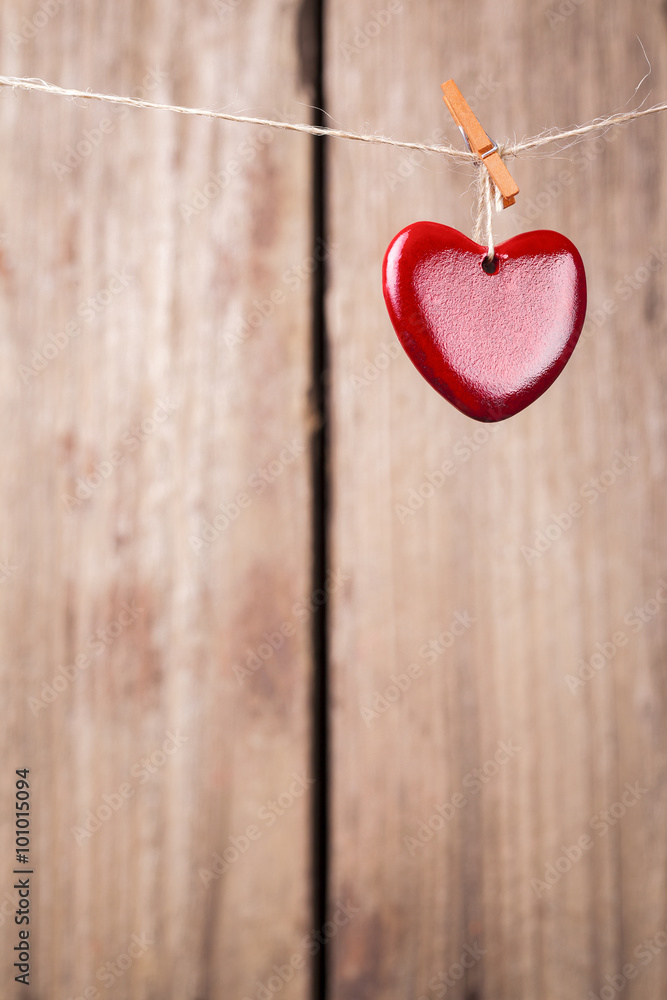 Valentine's heart against rustic wooden background Valentine's heart against rustic wooden background