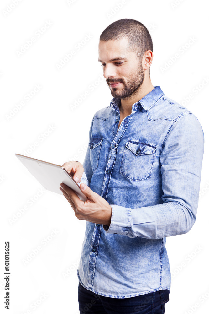Casual man using a tablet computer, isolated on white background Casual man using a tablet computer, isolated on white background