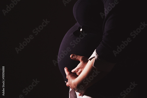 Pregnant woman with her husband happy 