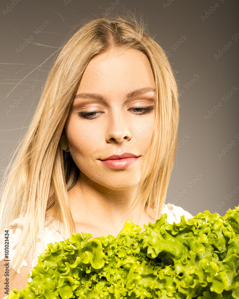 woman in the studio with a salad woman in the studio with a salad