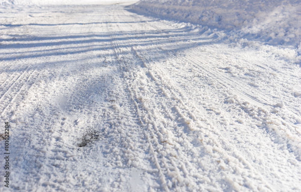 Background of tire tracks in snow