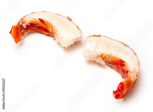 Cooked tropical Caribbean lobster (Panuliirus argus) or spiny lobster tail isolated on a white studio background photo