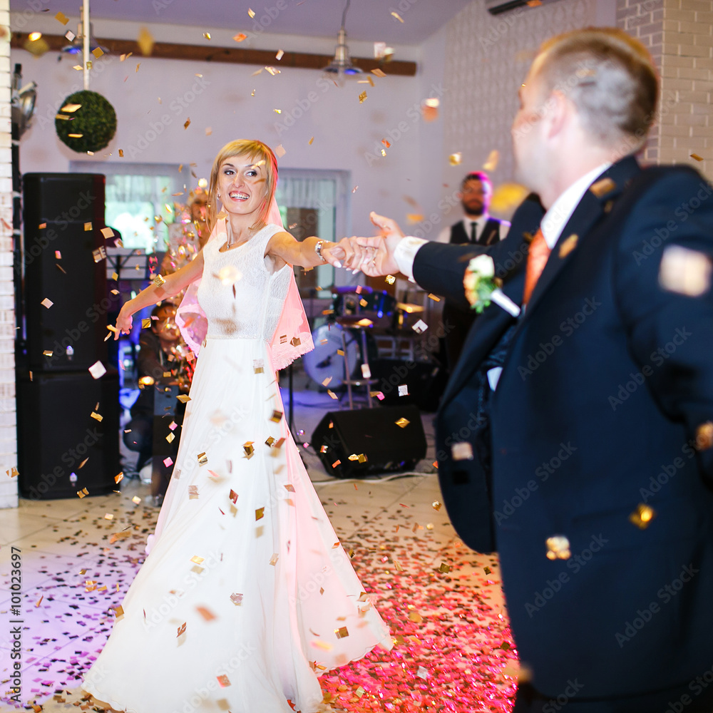 gorgeous stylish happy bride and groom performing their emotiona