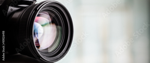 Close-up of a digital camera. Large copyspace