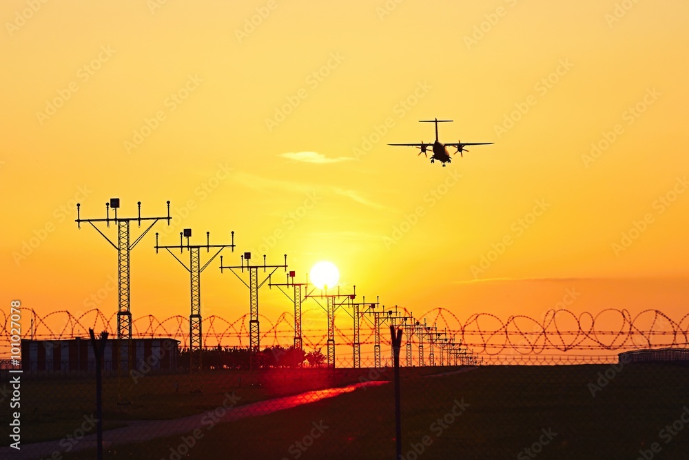 Airplane at the sunset Airplane at the sunset