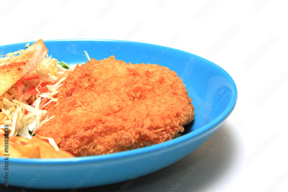 Breaded Fried Chicken steak, french fries, vegetables and toast bread Breaded Fried Chicken steak, french fries, vegetables and toast bread
